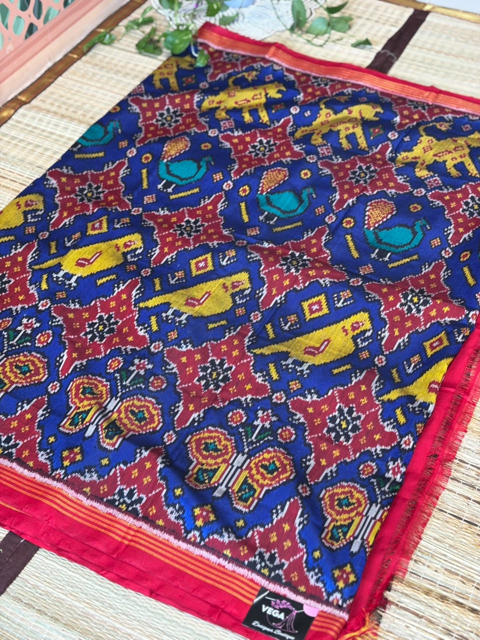 Pure Ikkat Silk Saree with Traditional Patola Weave & Animal Motifs