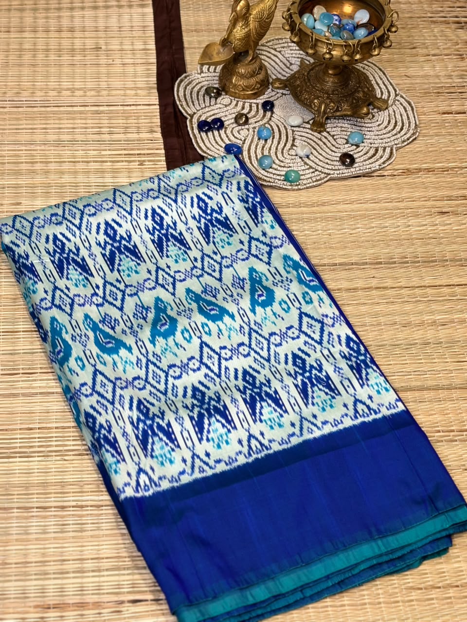 Pure Ikkat Silk Saree with Peacock &amp; Parrot Motifs on Contrast Off-White Border