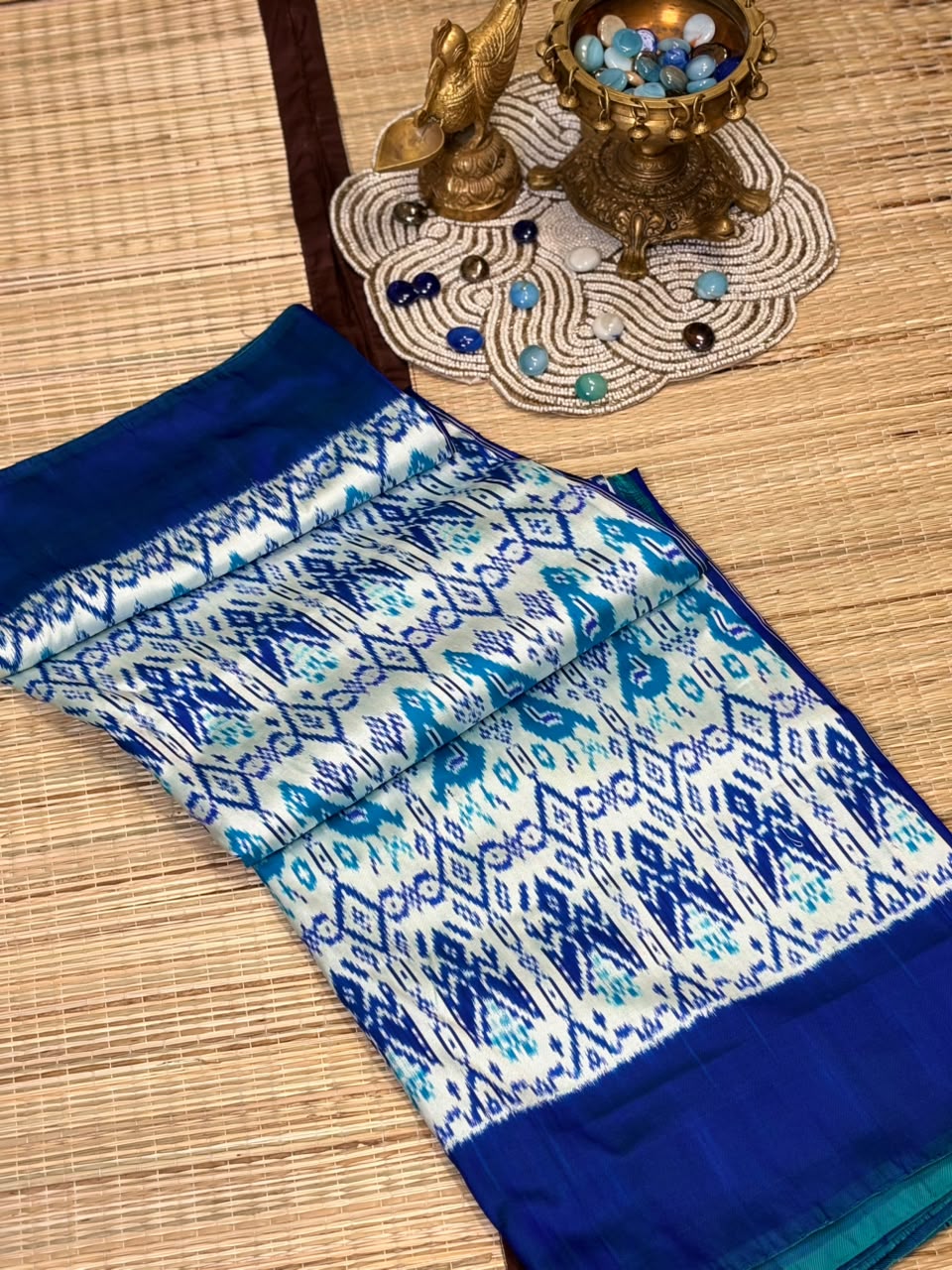 Pure Ikkat Silk Saree with Peacock &amp; Parrot Motifs on Contrast Off-White Border