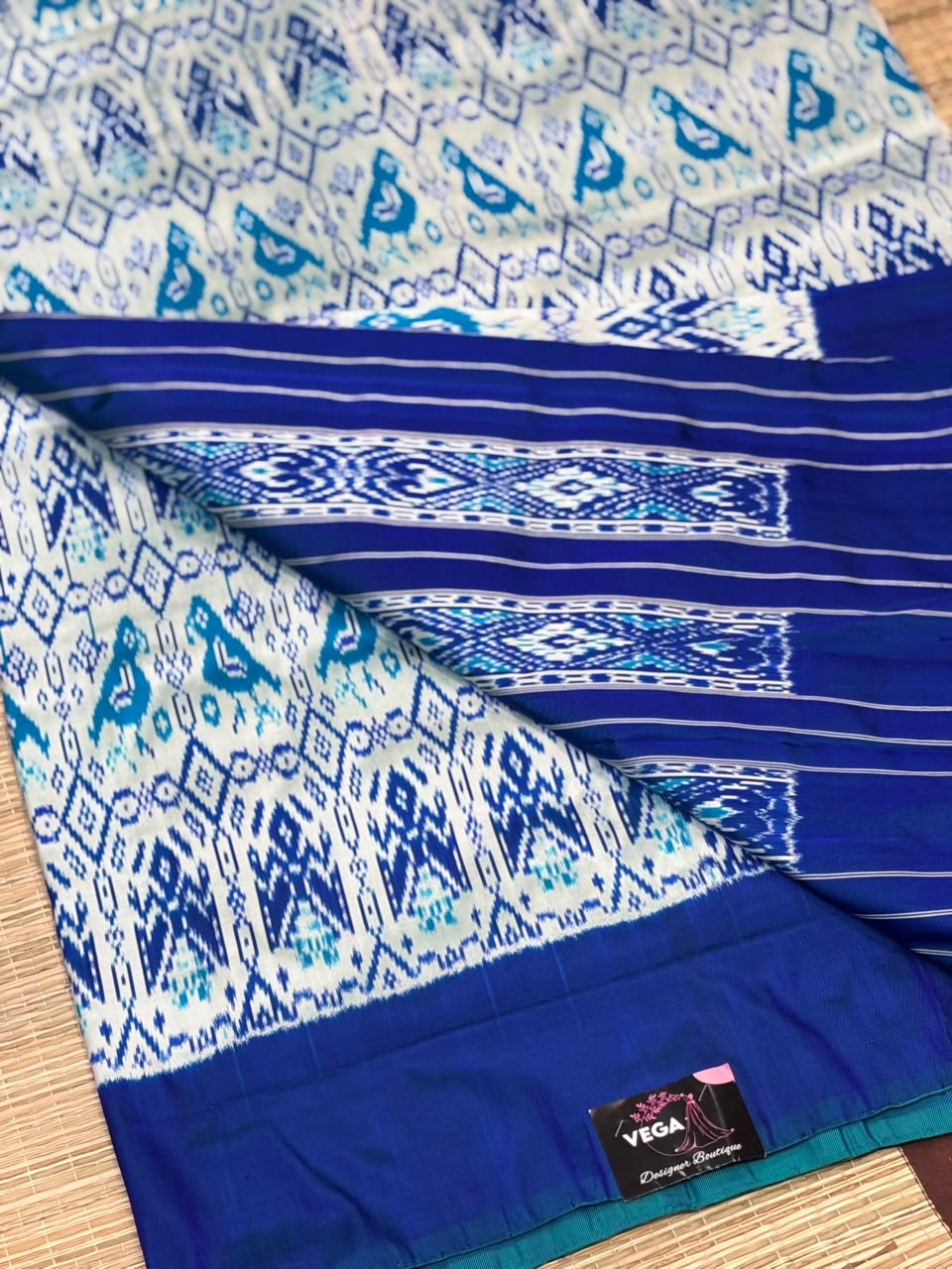 Pure Ikkat Silk Saree with Peacock &amp; Parrot Motifs on Contrast Off-White Border